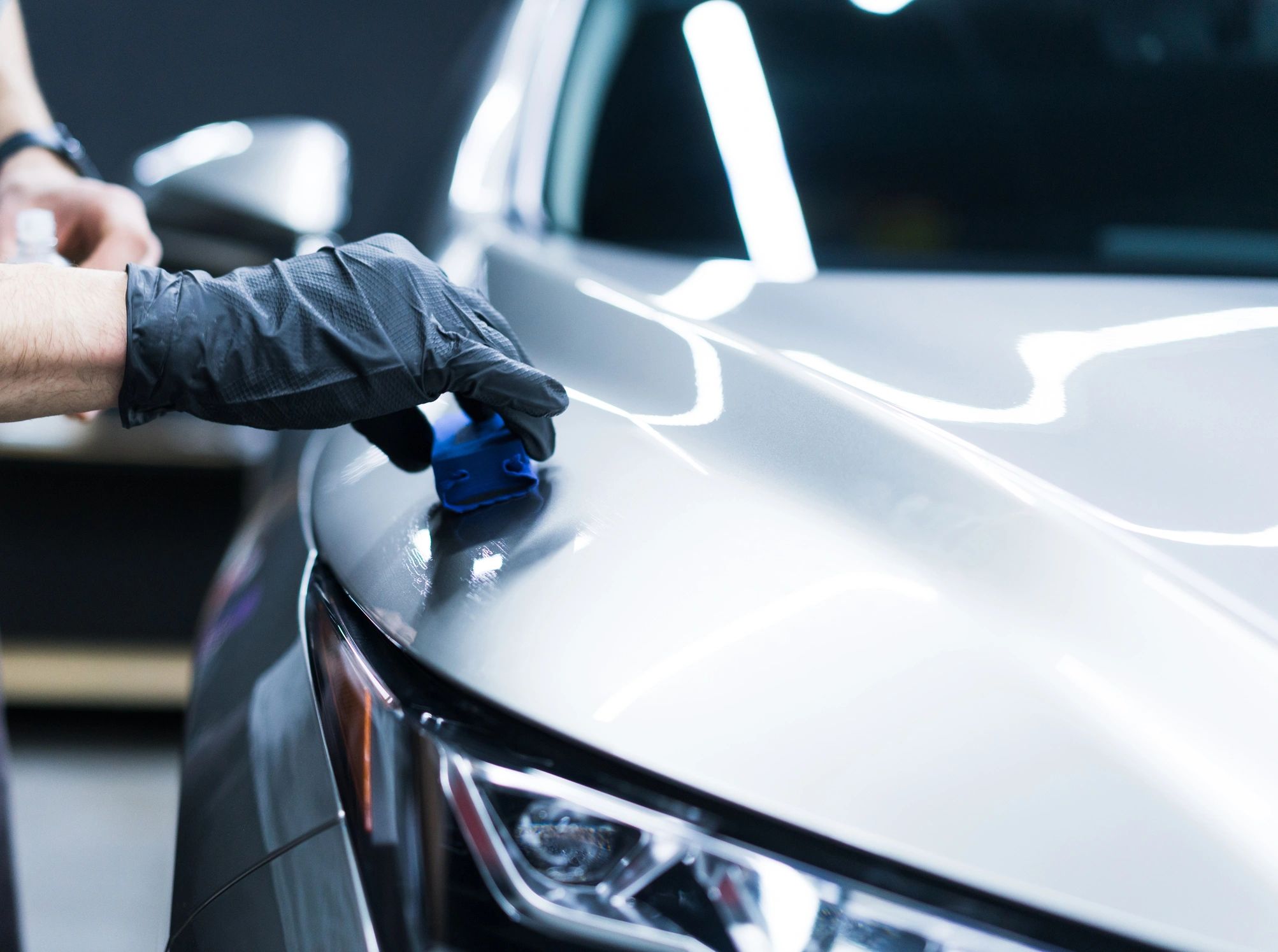Professional detailing technician at work